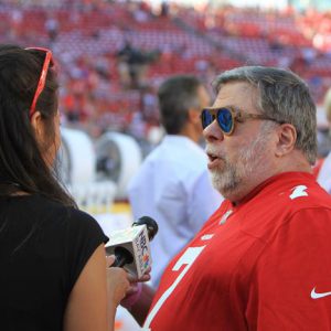 A reporter spots Woz at the game.